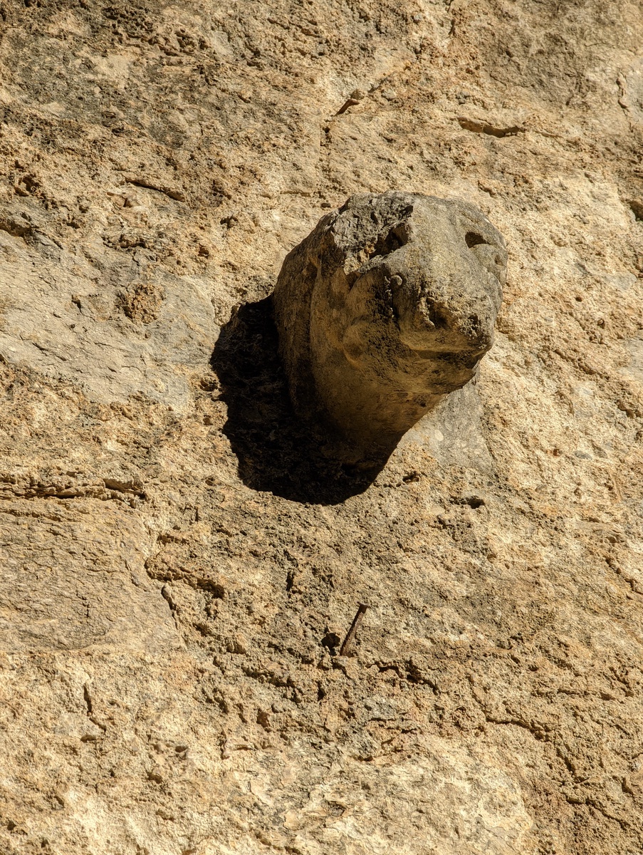 Rock in sandy surface