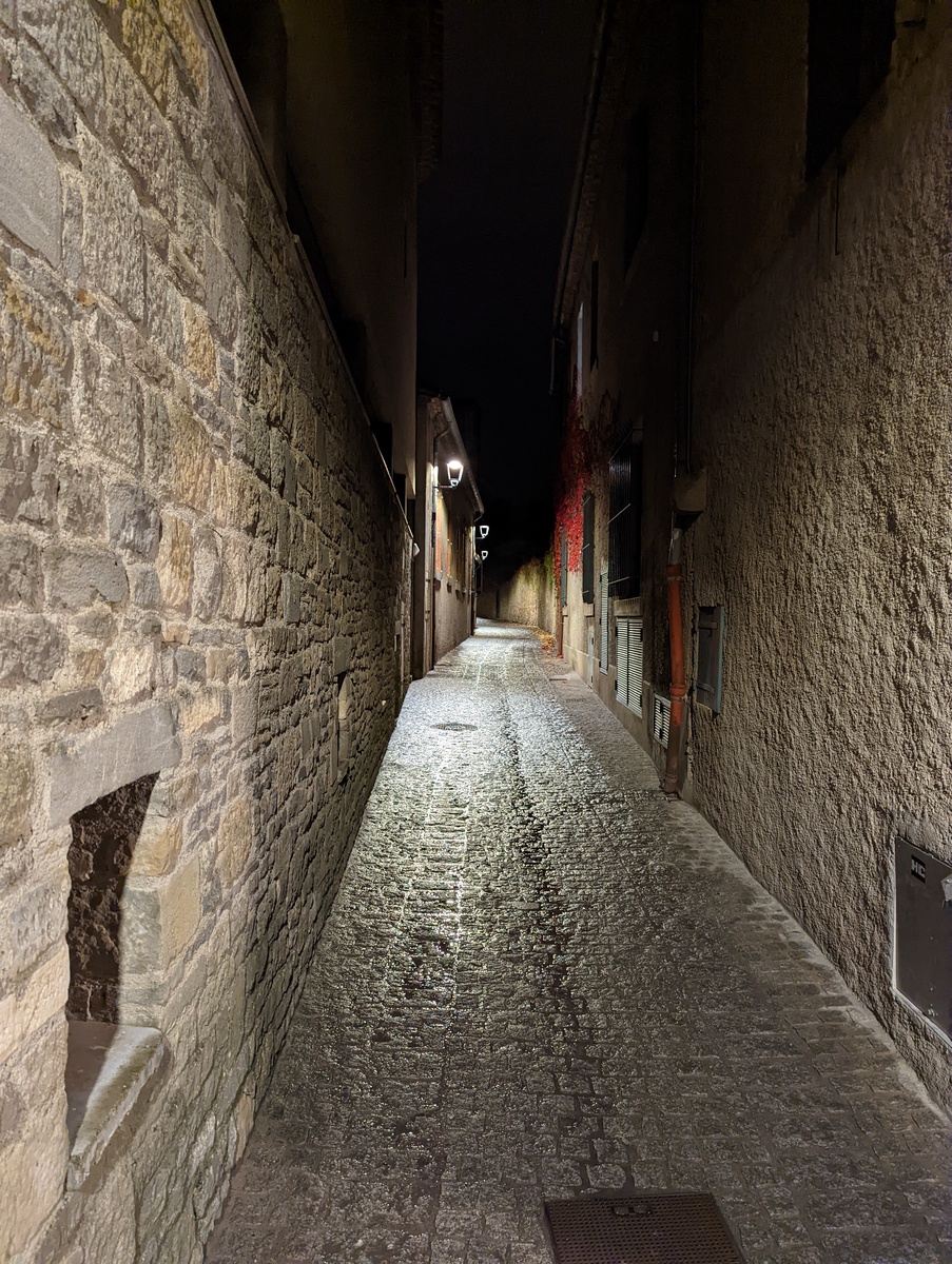 A narrow cobblestone street