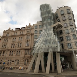 The Dancing Building in Prague, with "Patterned Windows" in a modernist manner, and which is of