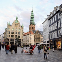 Copenhagen for  joinindaily with a three-wheeled cycle rickshaw driver resting before his next