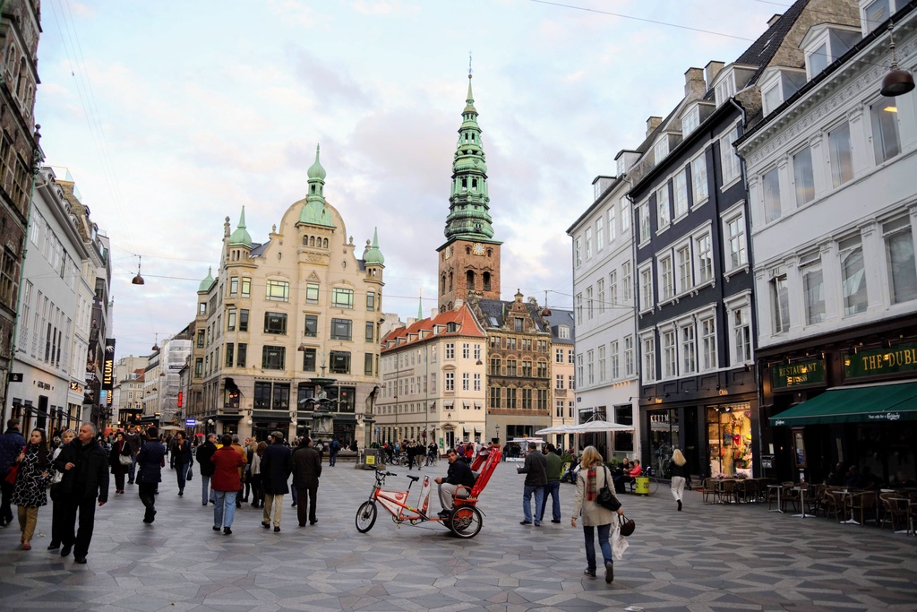 Copenhagen for  joinindaily with a three-wheeled cycle rickshaw driver resting before his next