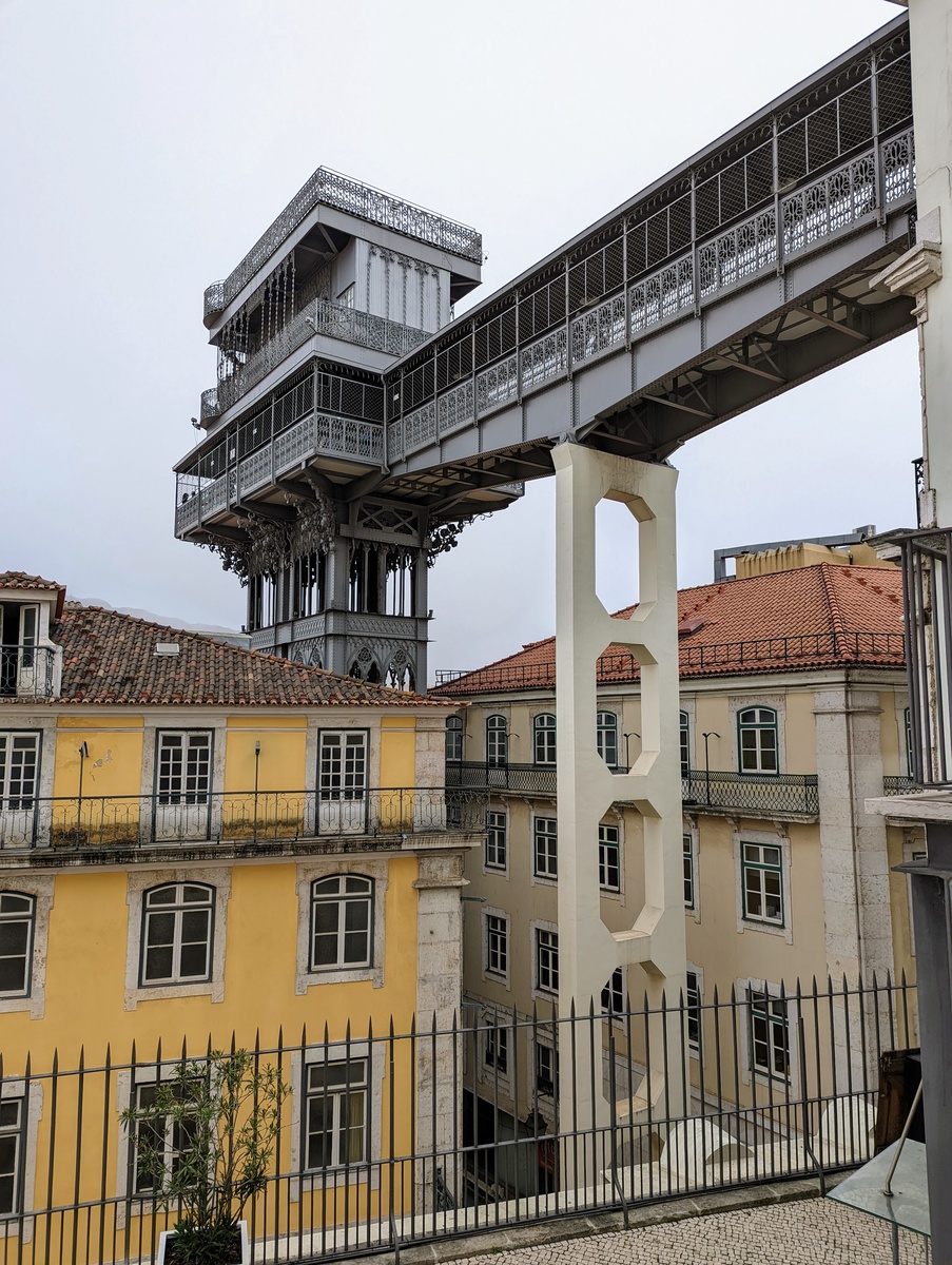 An art nouveau elevator structure connects high and low